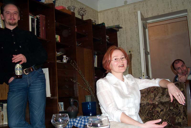 My brother J, his wife E, and S in the background, at my parents' home in Vilnius, Lithuania in May of 2004.
