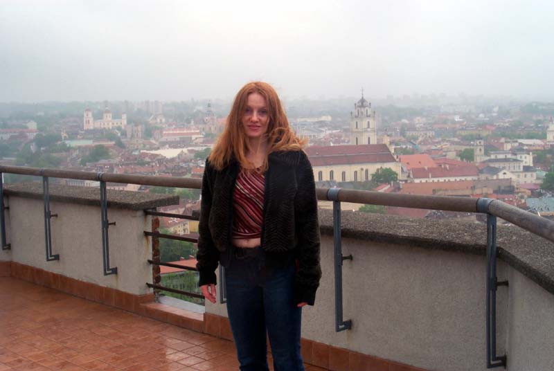 Me on the observation deck at the top of the Vilnius castle, with some of the Vilnius Old Town visible behind me (May 2004)