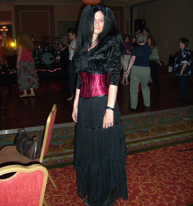 A person in a spectacular goth outfit at the ArmadilloCon dance. ArmadilloCon 2005, Austin, TX 2005.