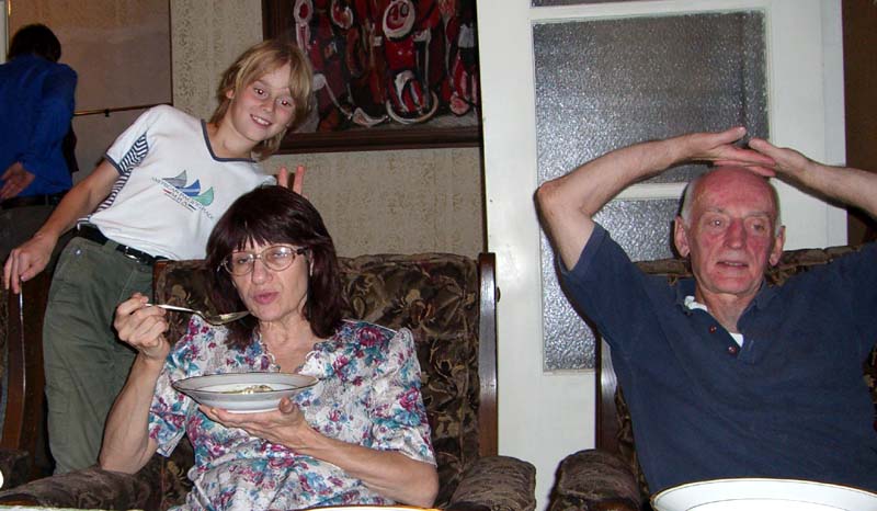 My mom, dad and my brother's son J at my parents' home. August 2005