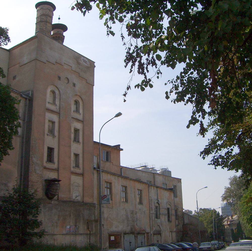 An old building in Vilnius with chimneys and arched windows, September 2005