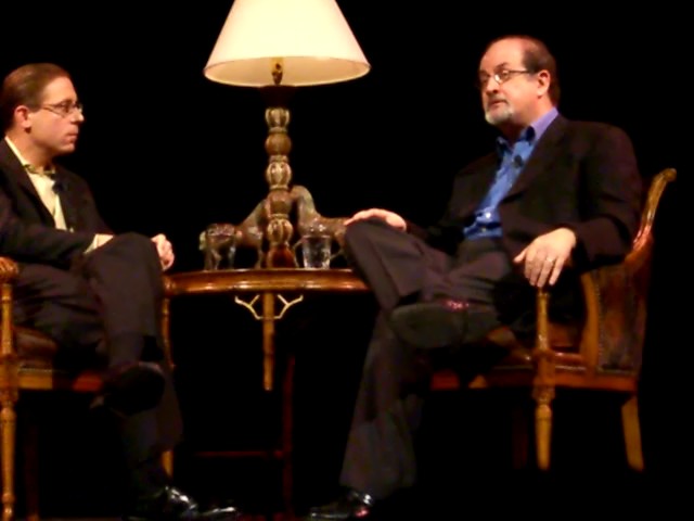 Evan Smith (left) interviewing Salman Rushdie at the Texas Book Festival in 2005