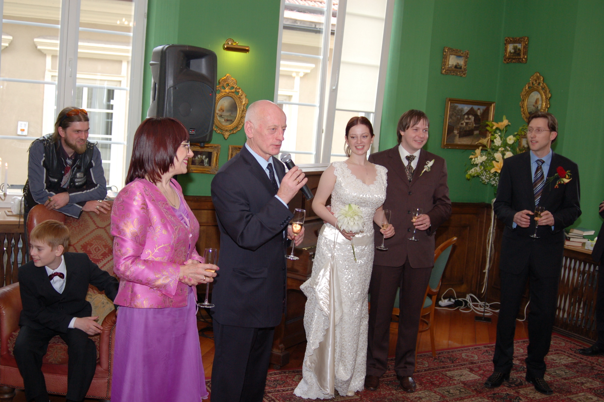 Mom and dad give a speech at the wedding reception