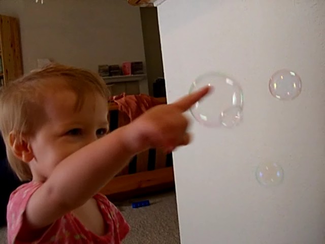 E pokes soap bubbles, October 2006
