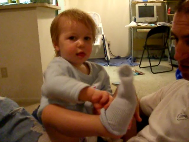 Learning to put on socks