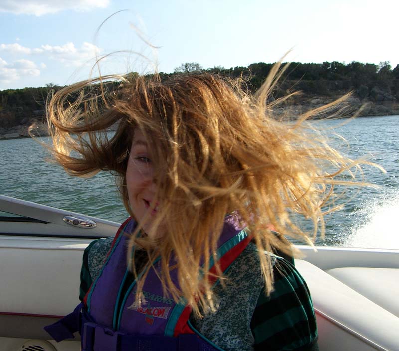 Me with wild hair on the boat