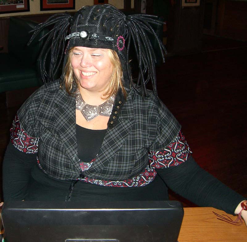 Ticket seller in a steampunk costume