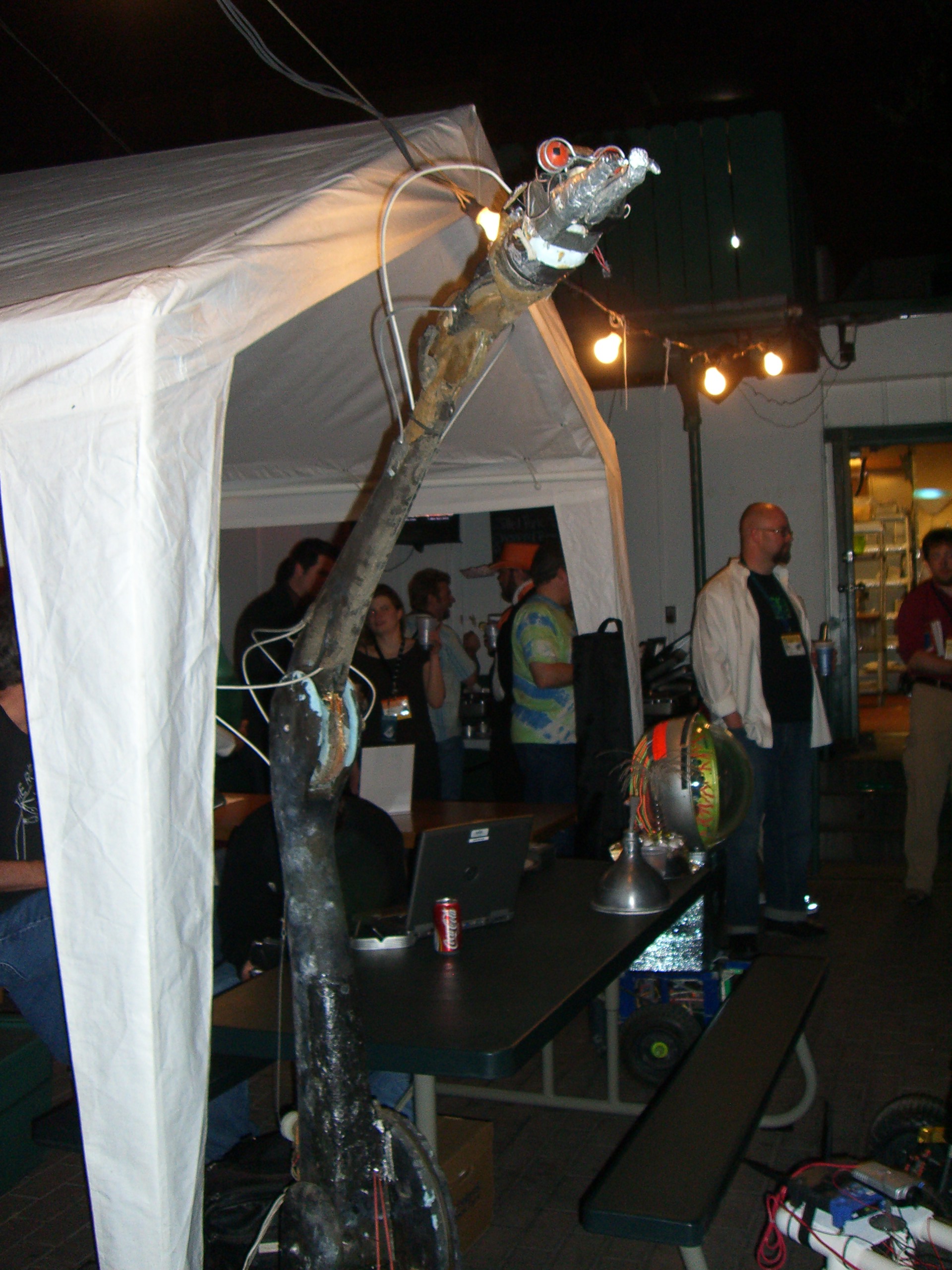 A robotic snake-like sculpture at the Robot Group booth