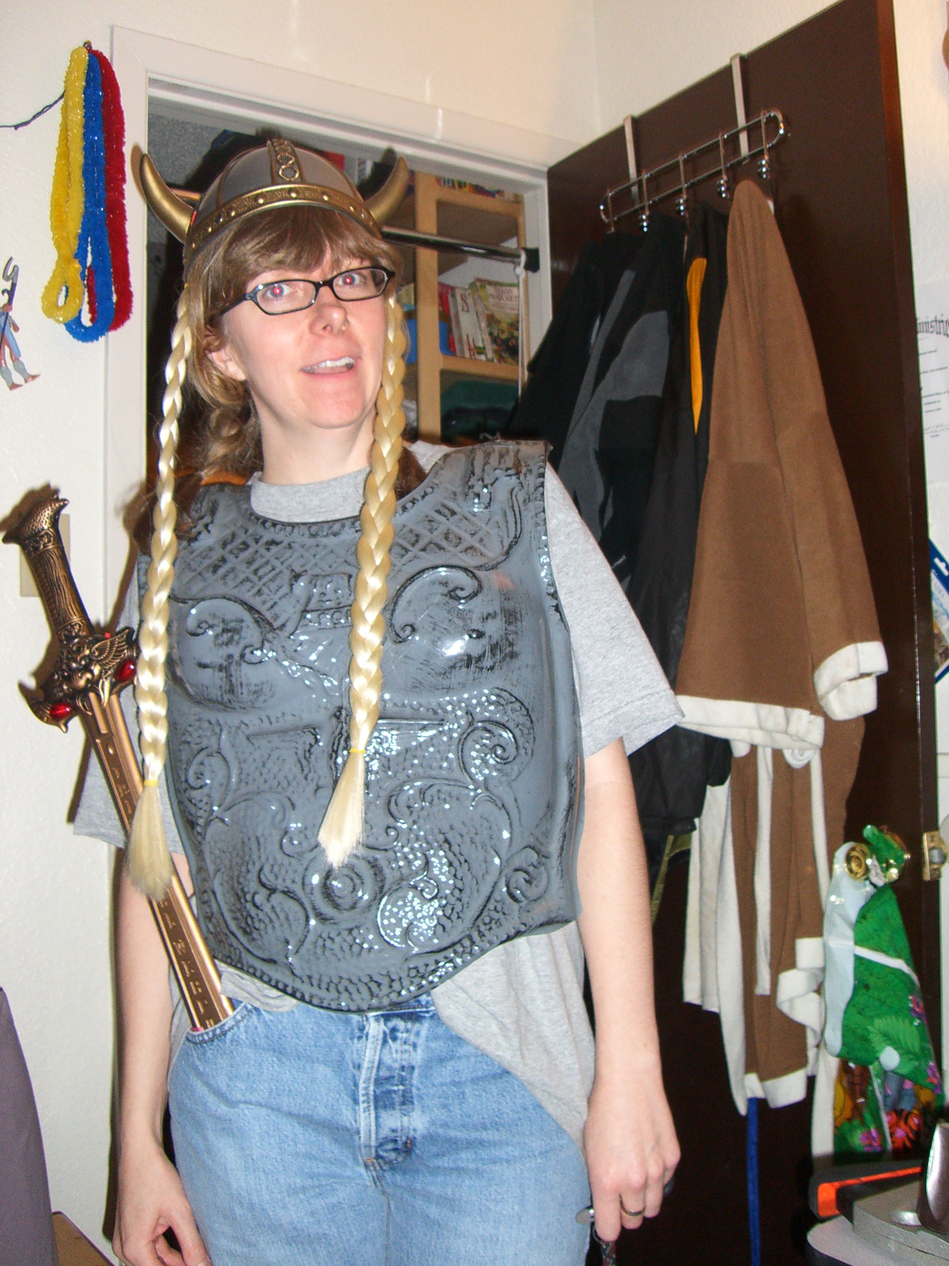 A in a viking helmet with braids