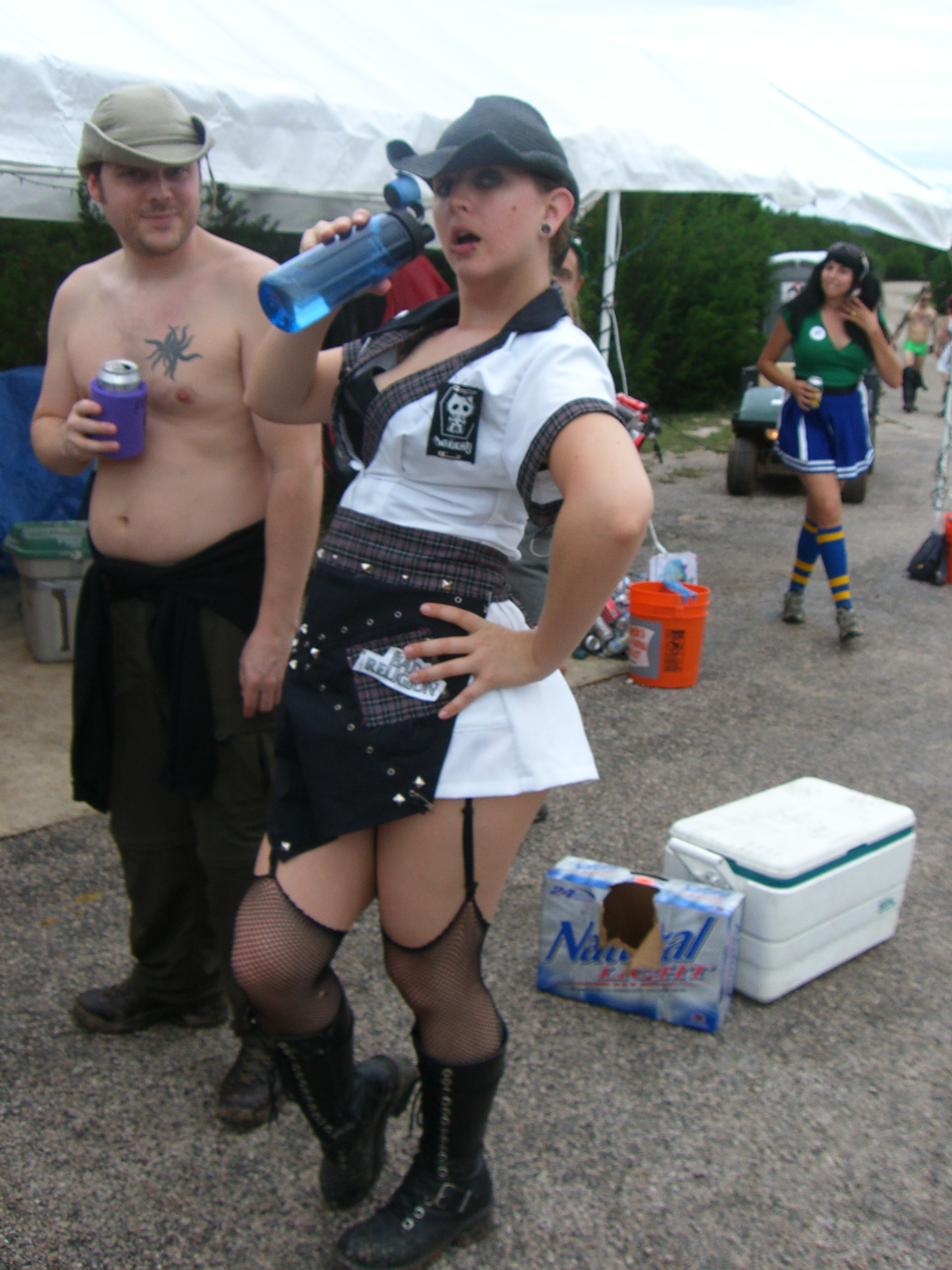 A greeter with an apron at the greeters station at Burning Flipside 2007