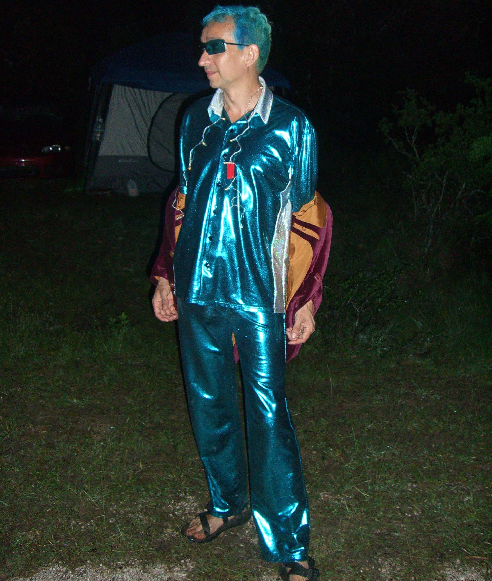 A person in a shiny teal costume at Burning Flipside 2007