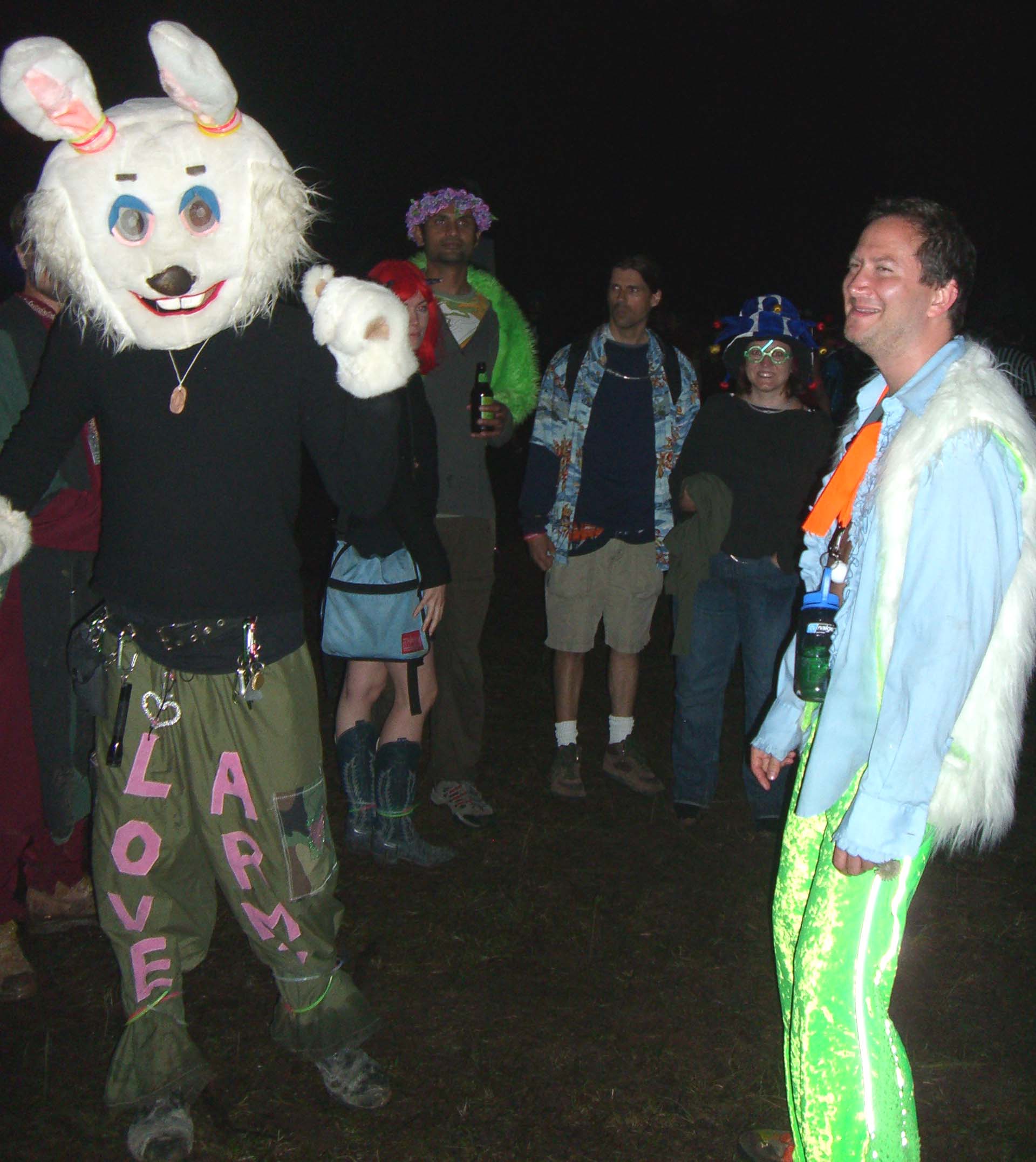 A person in a rabbit costume awaits the burn