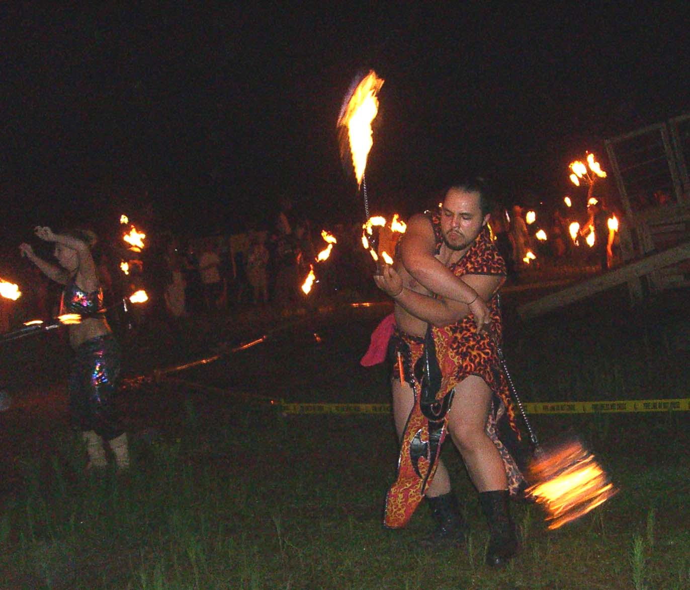 A fire spinner named Warlock performs at Burning Flipside 2007