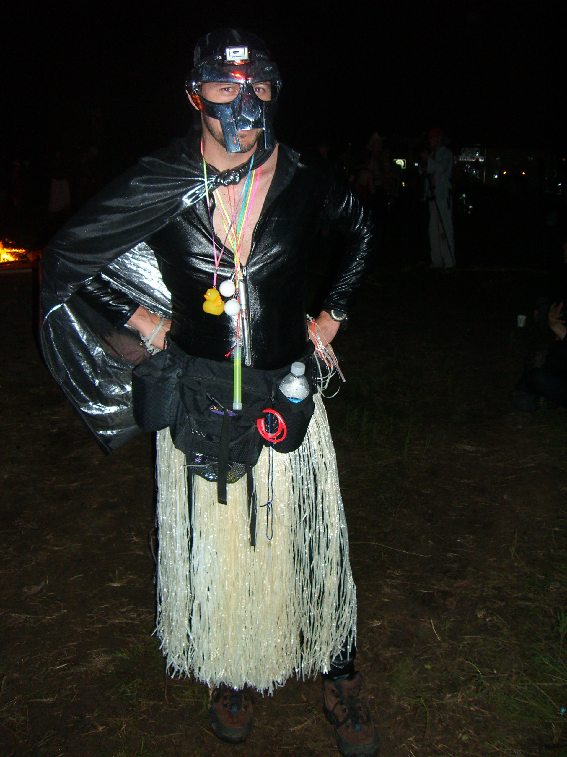 A person in an undescribable costume, with lots of fringe, at Burning Flipside 2007