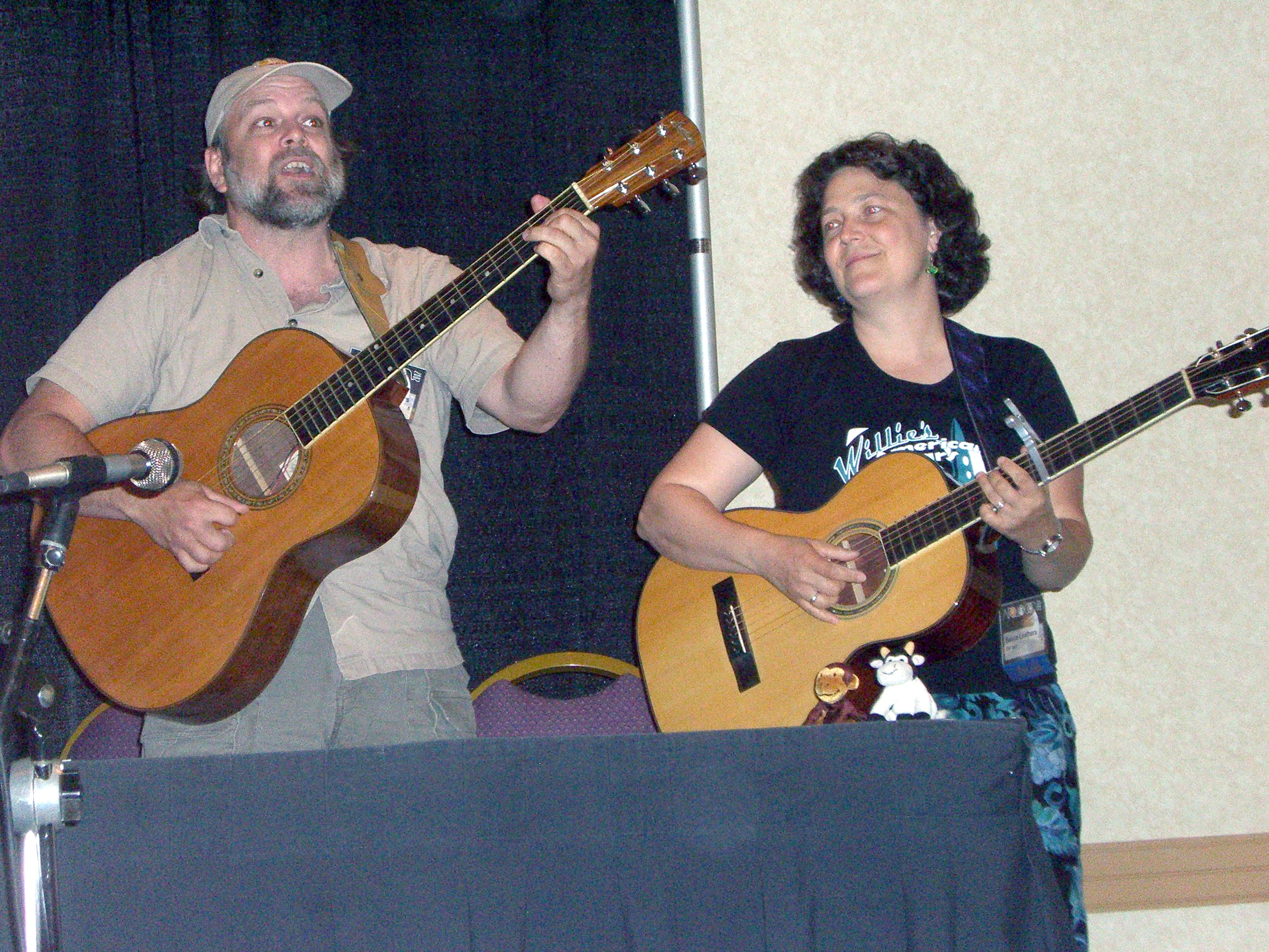Filk Guests of Honor Graham and Becca Leathers sing at the ApolloCon 2007 opening ceremony