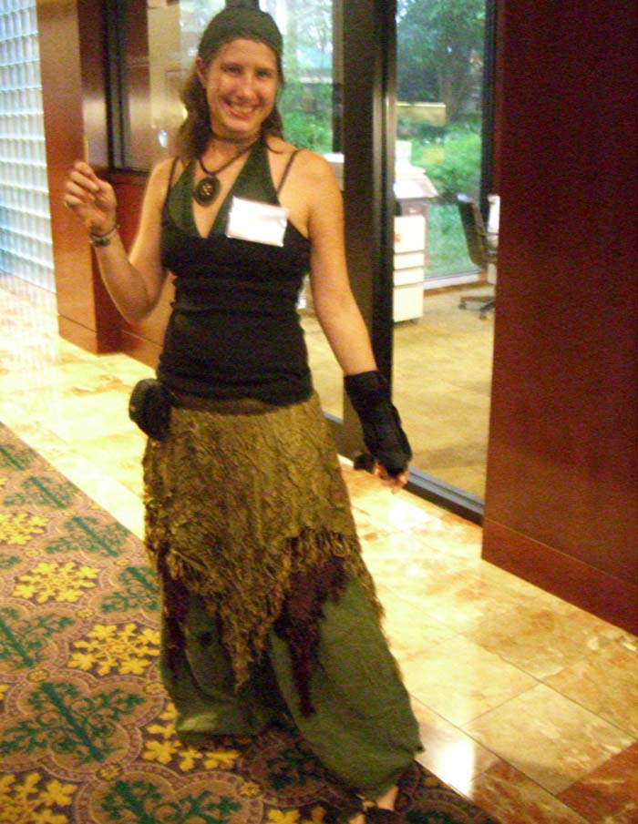 A congoer in a green Middle Eastern dance-inspired outfit at ApolloCon 2007