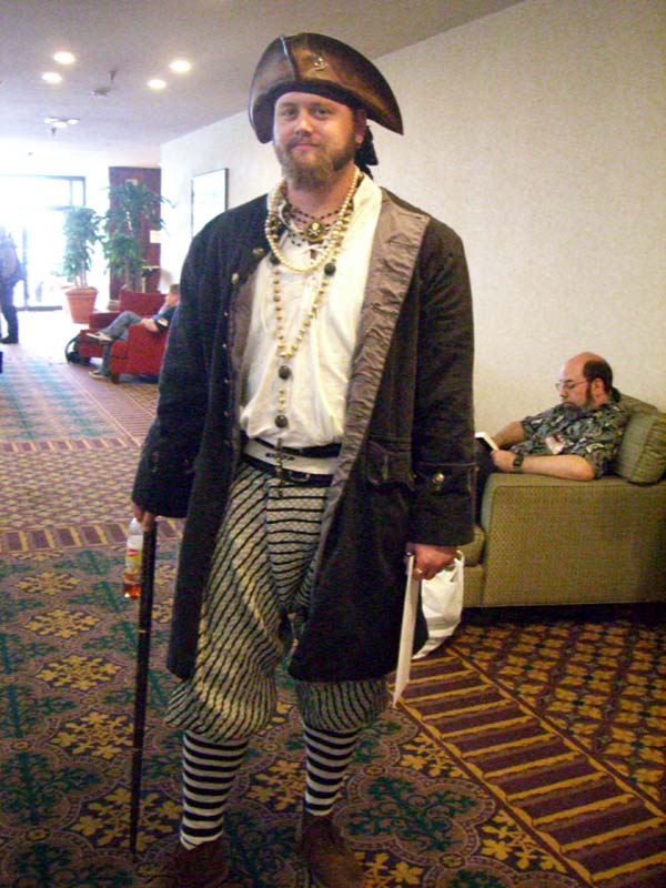 A costumer with a triangular hat at ApolloCon 2007