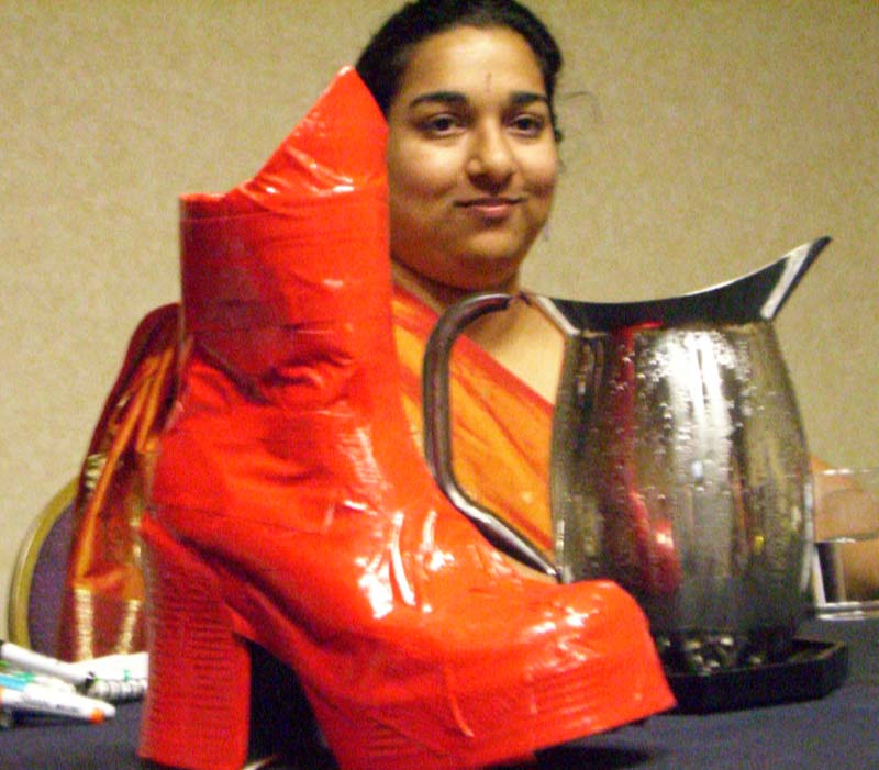 Shai with a boot covered in red tape