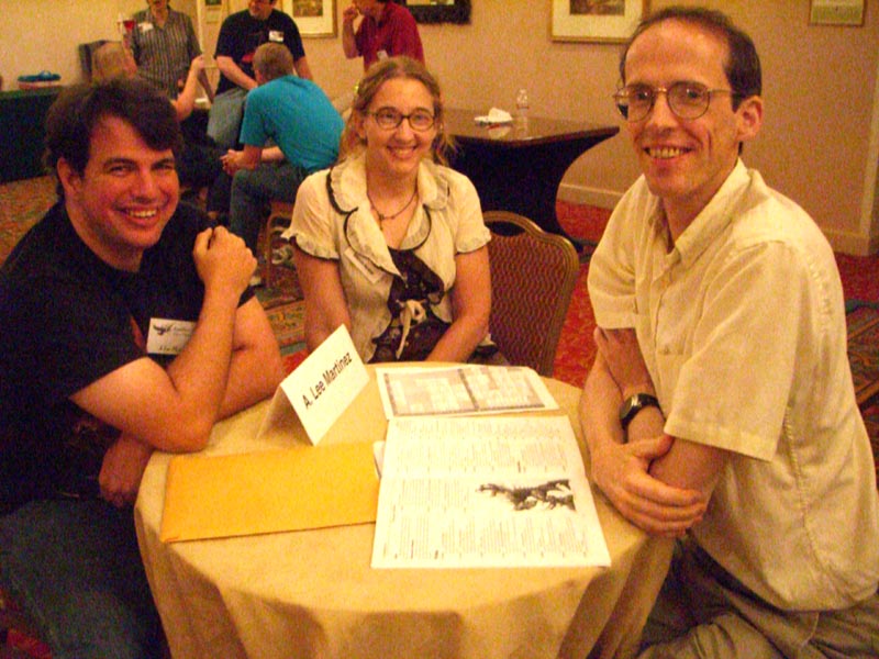 SF/F author A. Lee Martinez (left) and two congoers at the Meet The Pros party at ArmadilloCon 2007