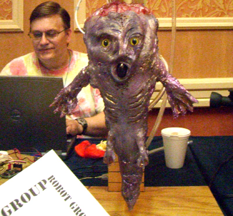 A purple alien made by Robot Group at the Robot Group booth at the ArmadilloCon 2007