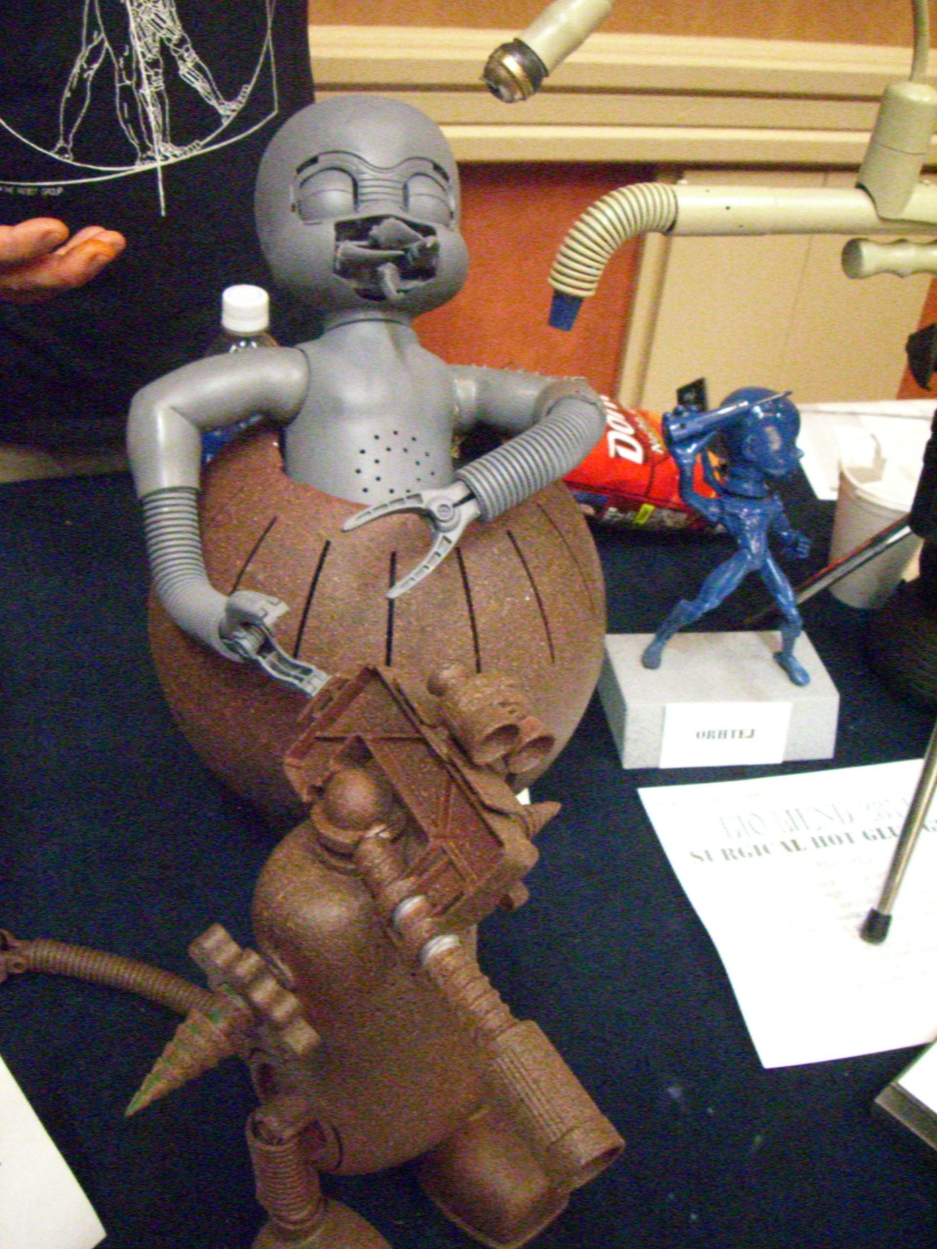 A grey alien with mouth tentacles, made by the Robot Group, at ArmadilloCon 2007