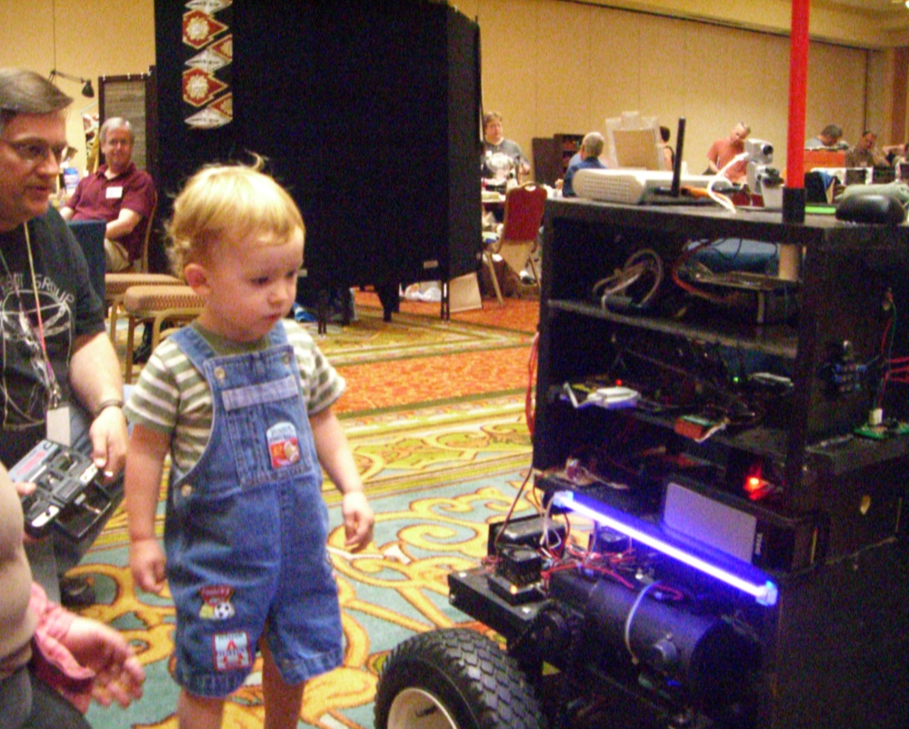 Side view of a robot on wheels, made by Eric Lundquist, at the ArmadilloCon 2007