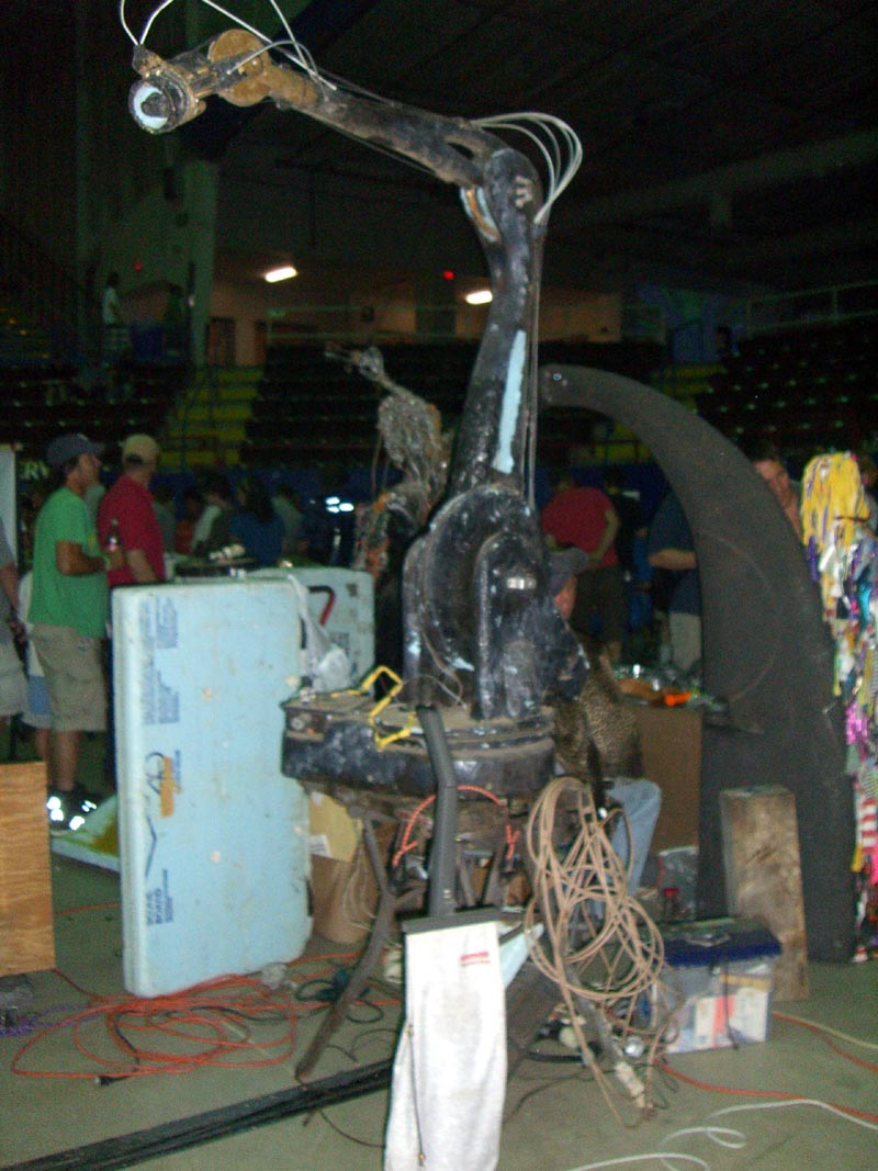 Tall robot connected to a vacuum cleaner at the Maker Faire 2007