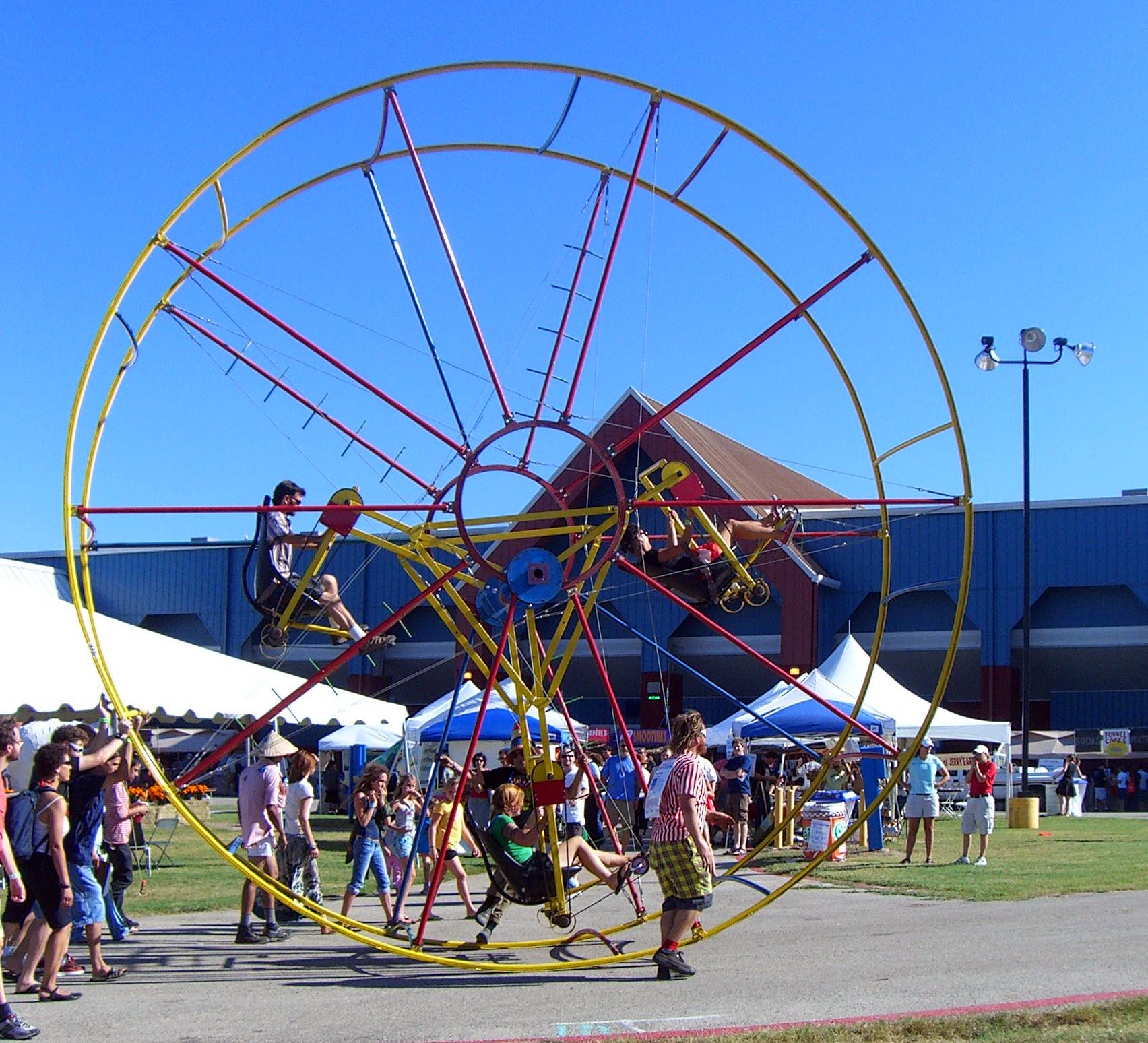 A pedal-powered mini Ferris wheel at the Maker Faire 2007