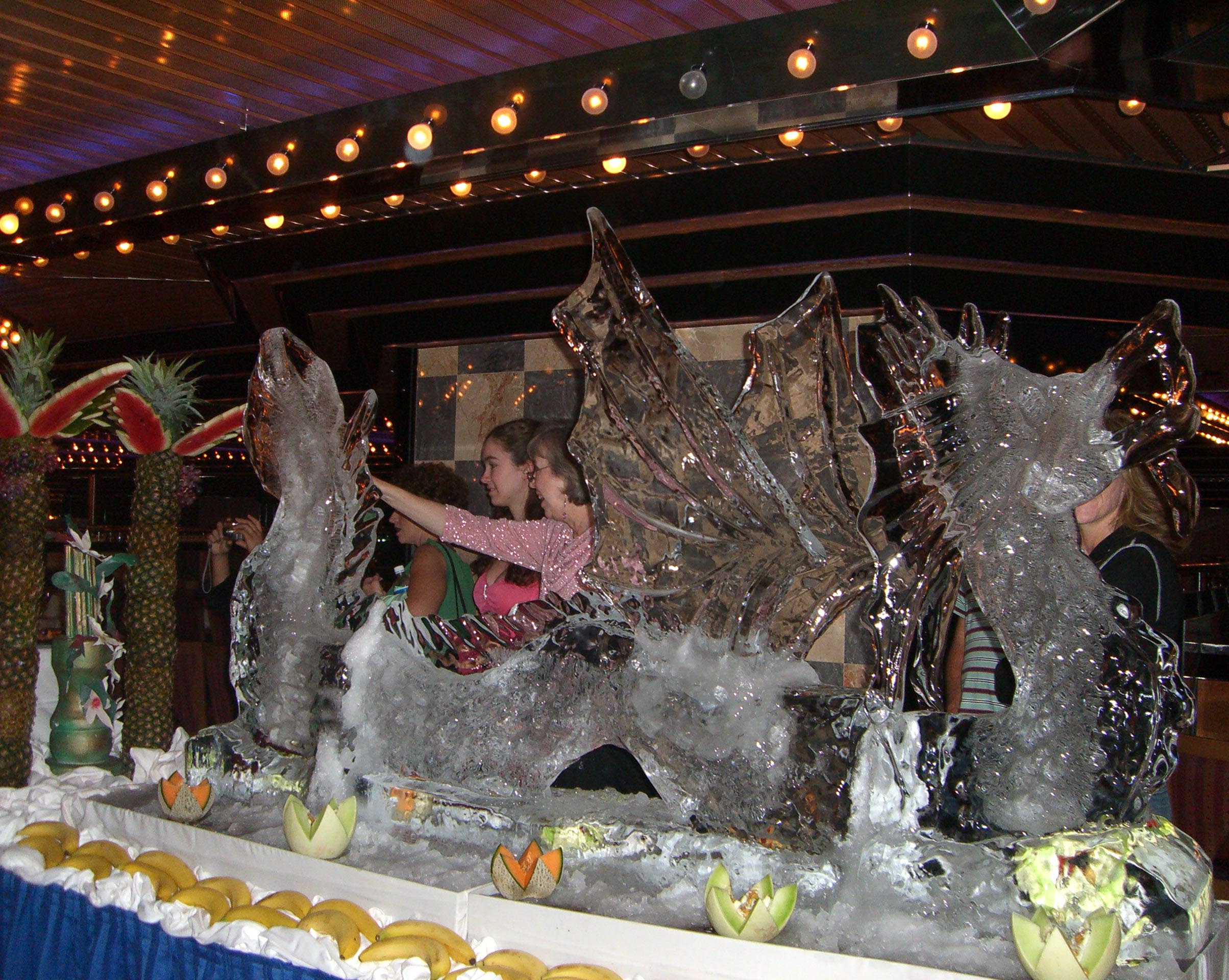 An ice sculpture of a dragon on a cruise ship grand gala buffet