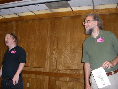 Eric Raymond (left) and John Quarterman at Linucon 2005 Larval Mode panel