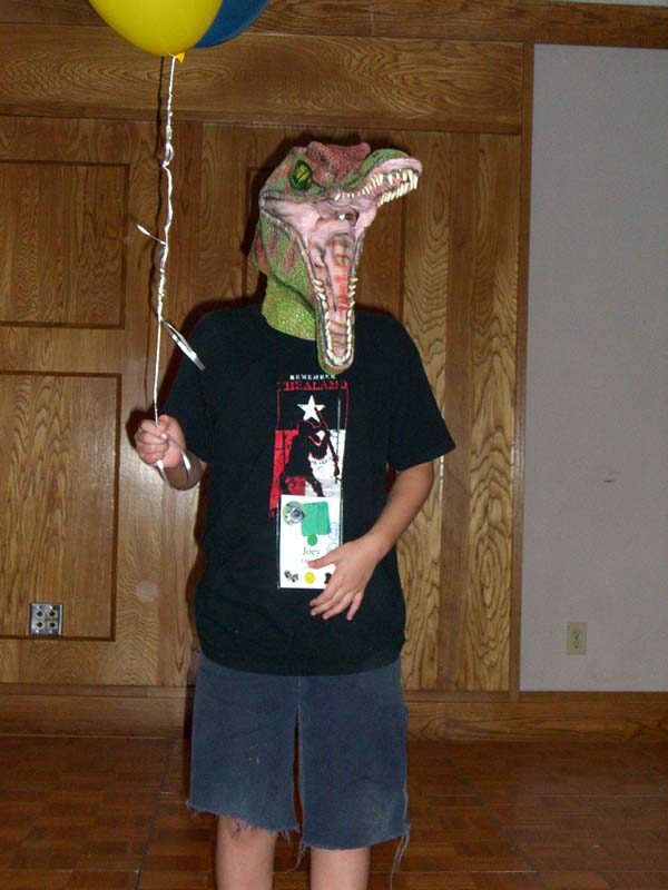 A costume with a crocodile head